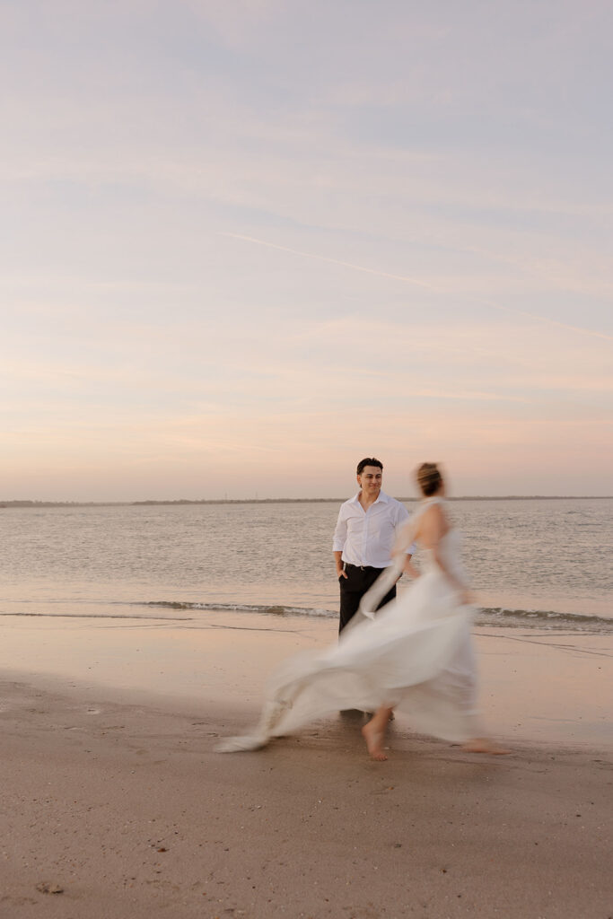 Folly Beach elopement photos at sunset with lighthouse by Leigha Gray Photography